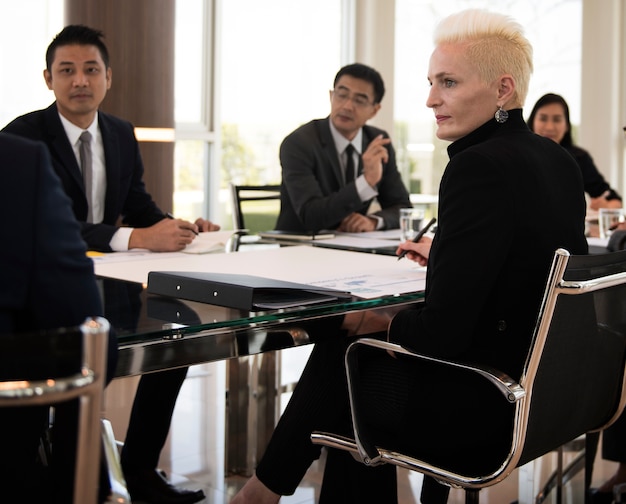 Corporate legal advisory team reviewing commercial contracts in Singapore office
